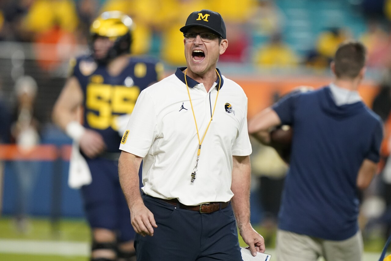 Michigan Wolverines head coach Jim Harbaugh yells before College Football Playoff semifinal at Orange Bowl, Dec. 31, 2021