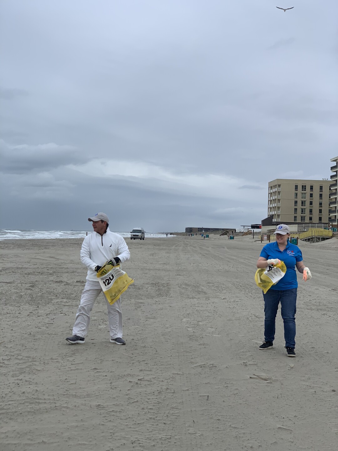 Beach clean up Paulo and Keli.jpeg