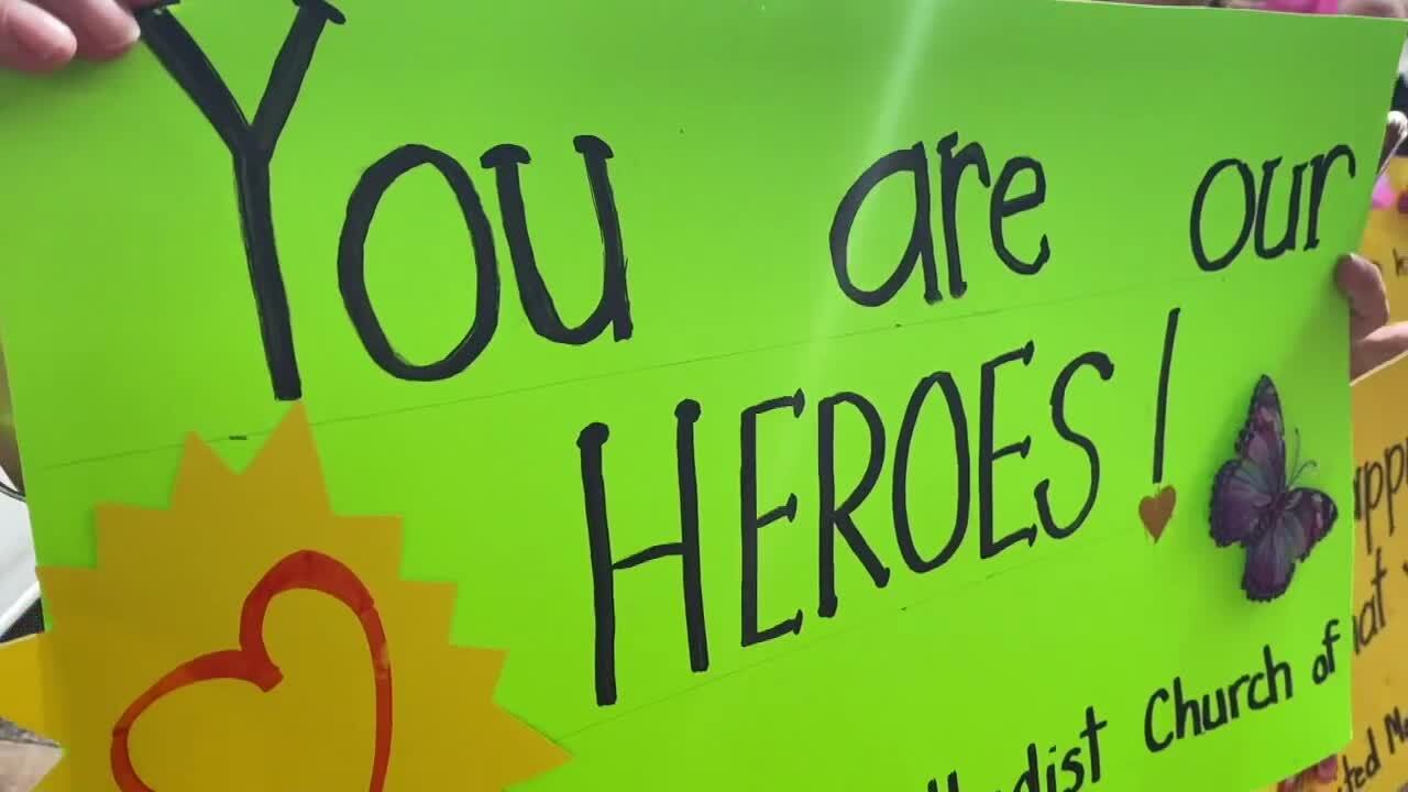 'You are our heroes!' sign made by church group outside Lawnwood Regional Medical Center