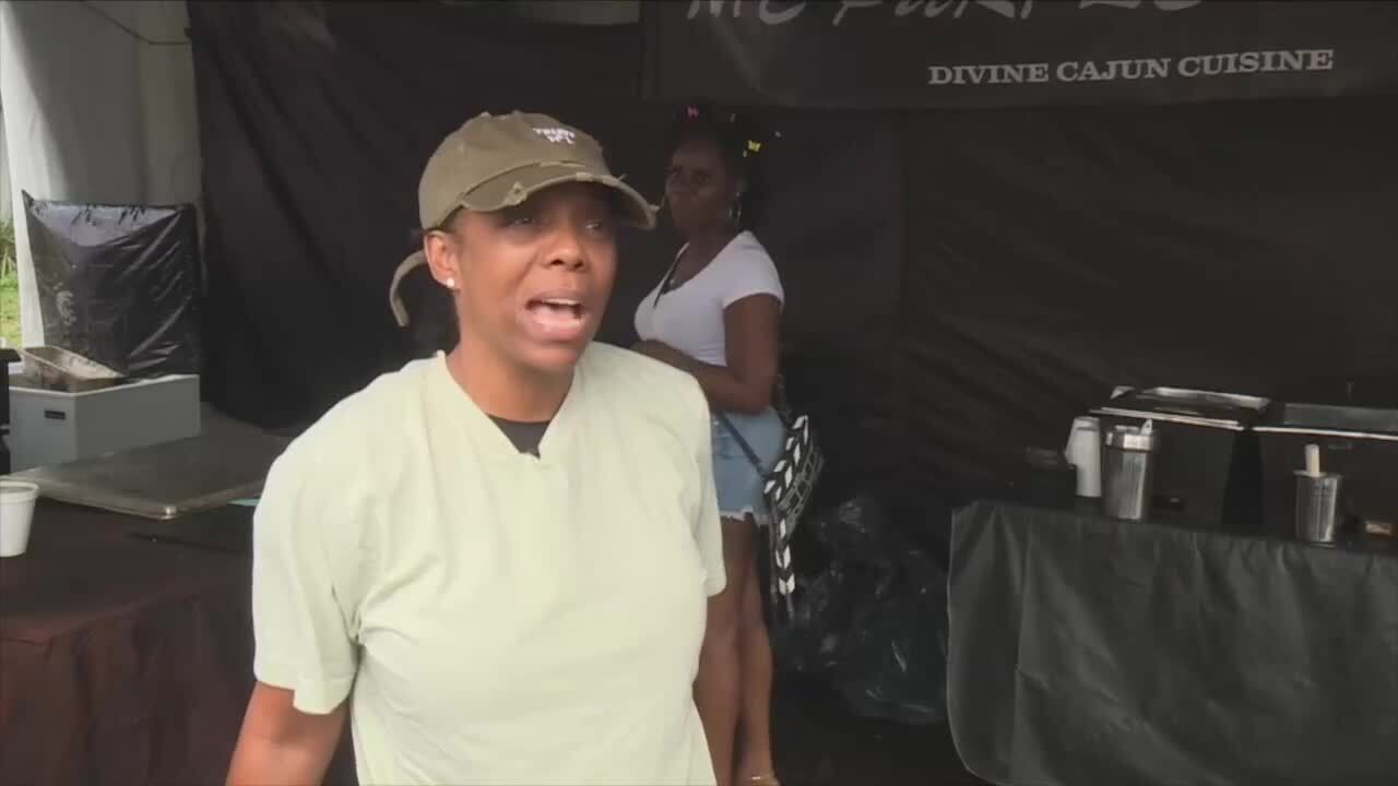 Cynthia Rolle with Purple Shrimp says attendance at South Florida Fair better than previous years