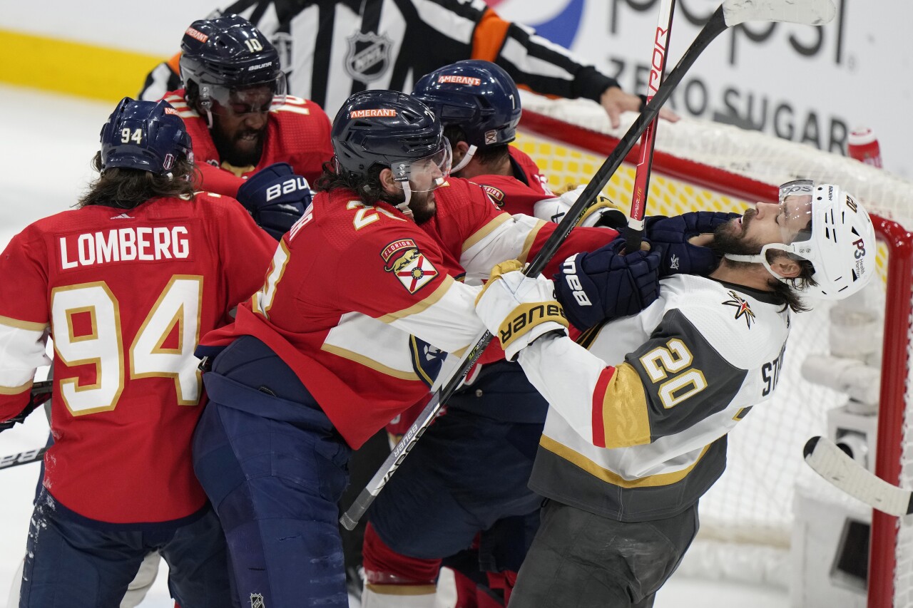 Florida Panthers defenseman Josh Mahura and Vegas Golden Knights center Chandler Stephenson fight during third period of Game 4 of Stanley Cup Final, June 10, 2023