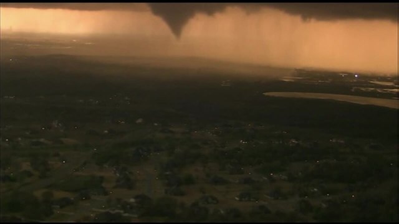 PHOTOS: Tornado forms, touches down