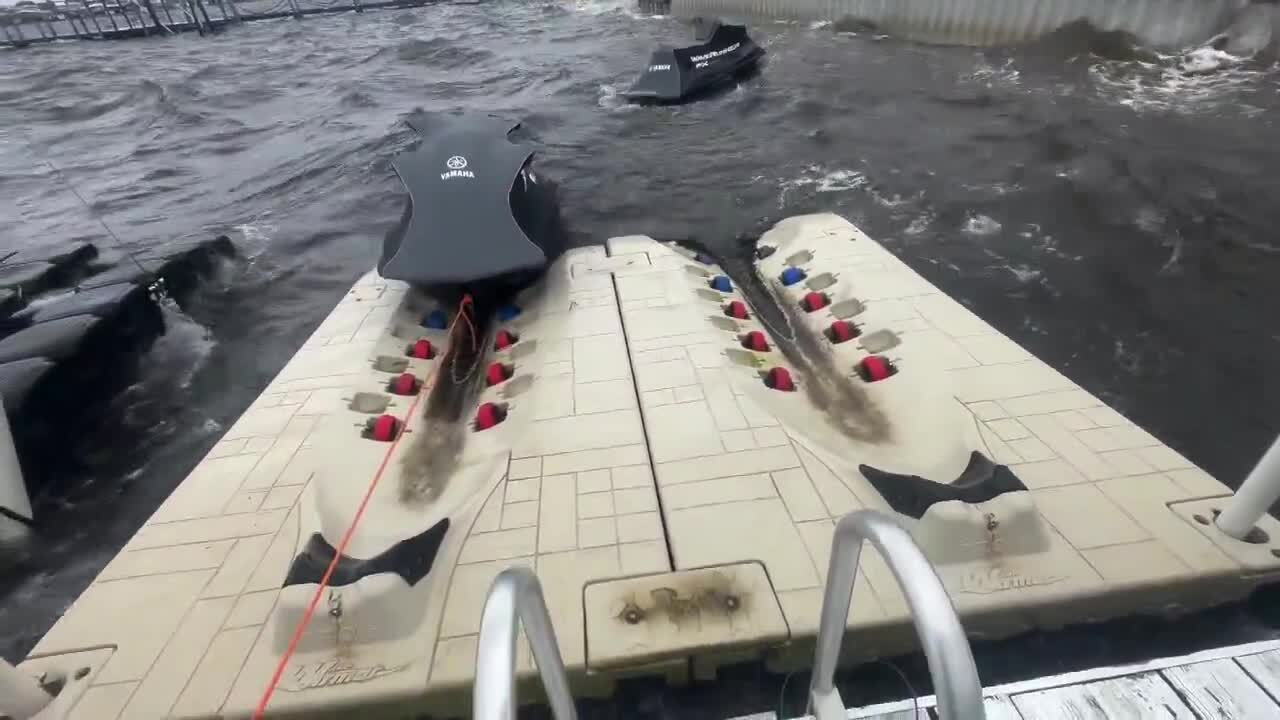 Perry Reinstein's Yamaha WaveRunners knocked off his Lake Worth Beach dock in rough waves, Dec. 14, 2023