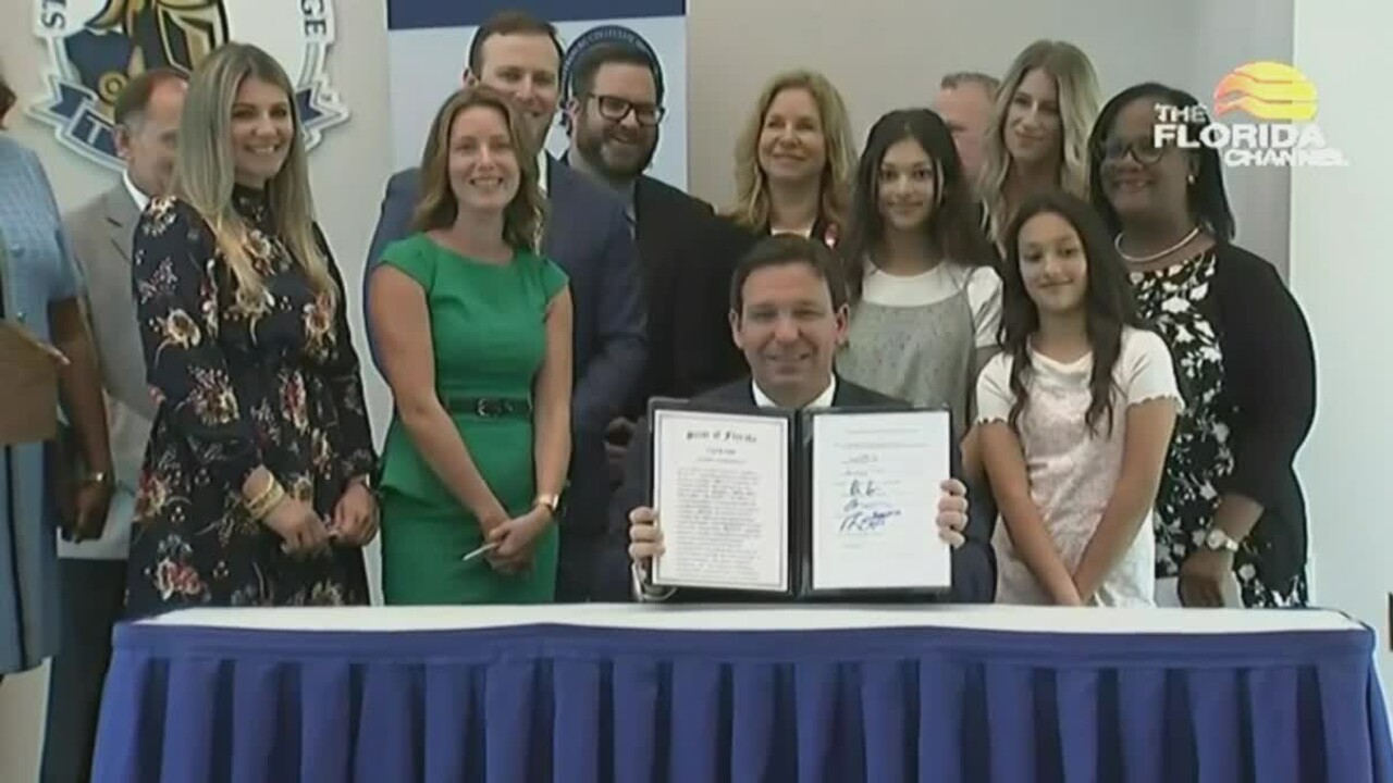 Florida Gov. Ron DeSantis signs SB 1048, Student Assessments, into law in St. Petersburg on March 15, 2022.jpg