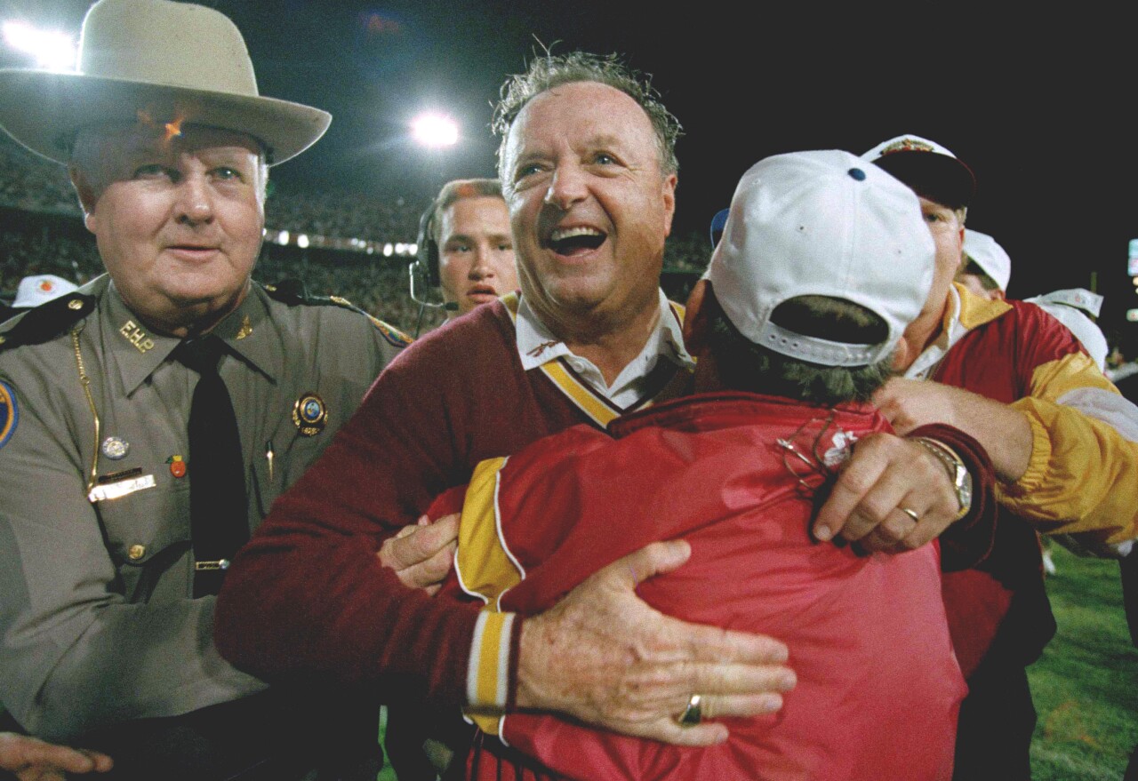 Florida State Seminoles head coach Bobby Bowden hugged after beating Nebraska in Orange Bowl to win 1993 national championship