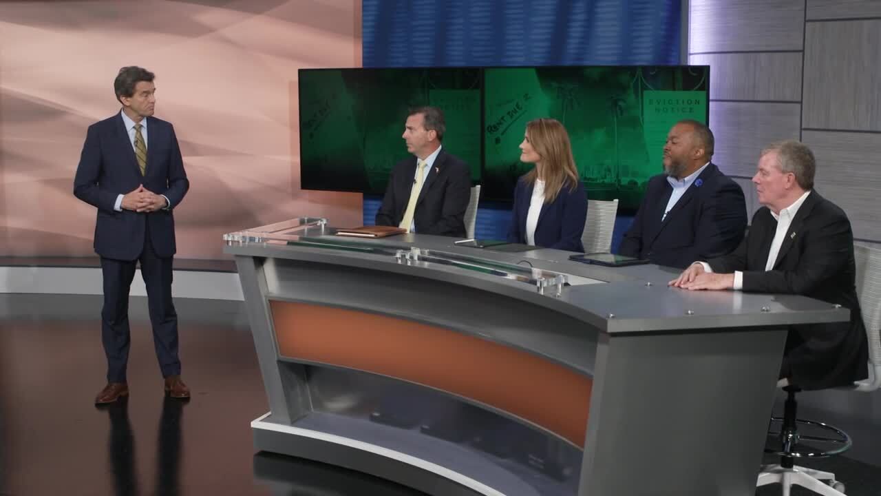 Michael Williams speaks to panelists at 'Priced Out of Paradise' town hall