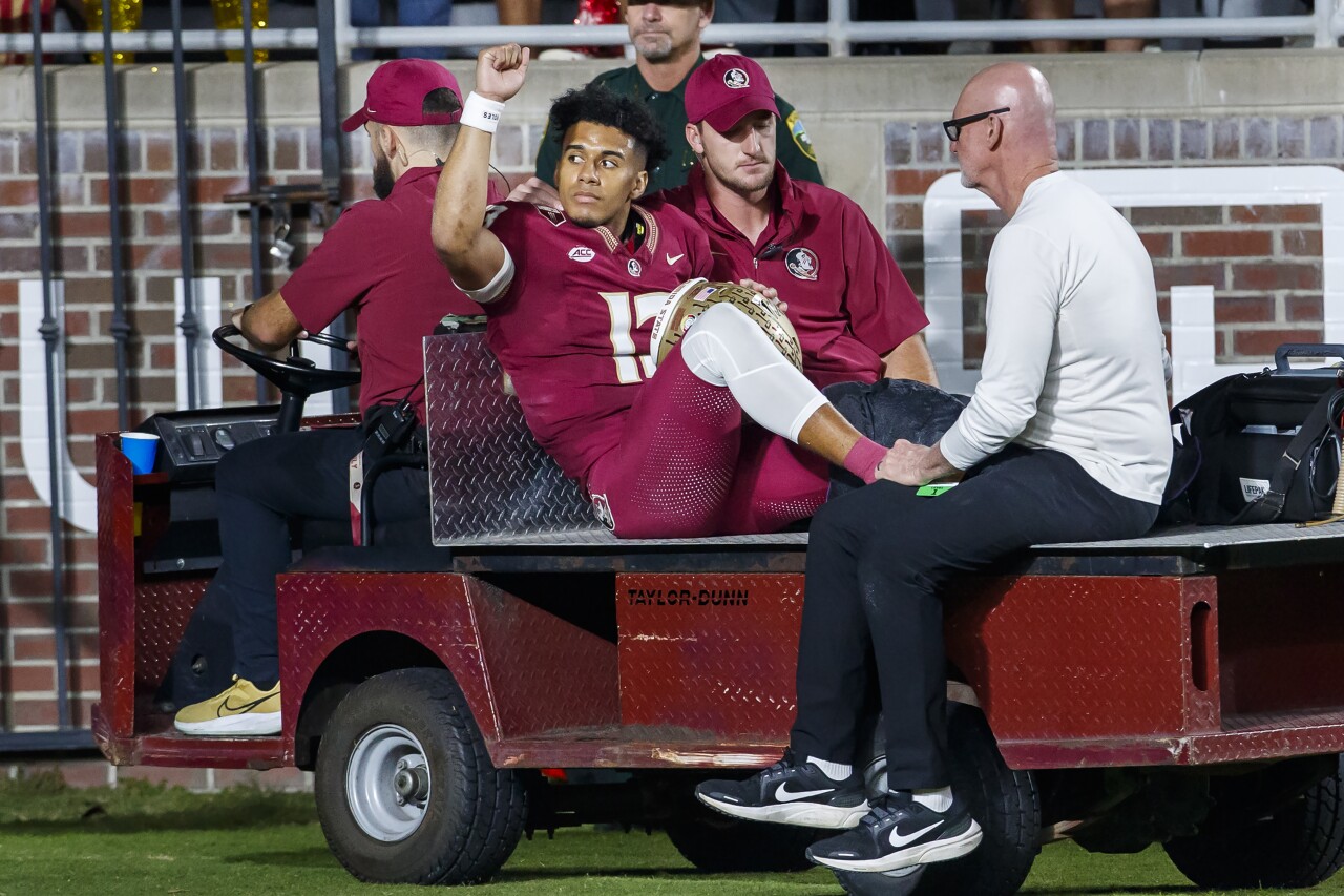 Florida State Seminoles QB holds fist to crowd as he's carted off field after injury, Nov. 18, 2023