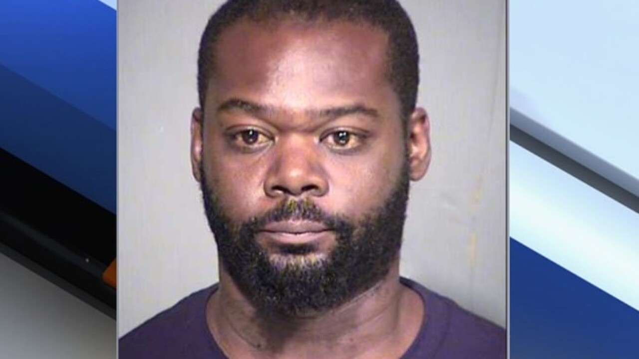 Police: Phoenix father arrested after holding knife to child's throat
