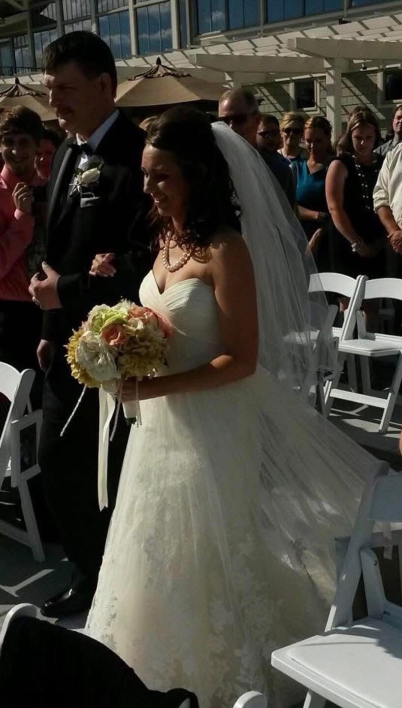 West Bend bride discovers wrong wedding dress 11 years after preservation