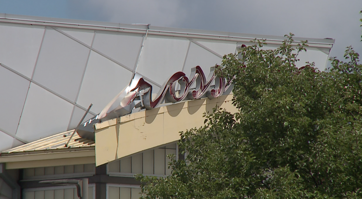 A twisted sign hangs over a corridor at Severance Town Center.