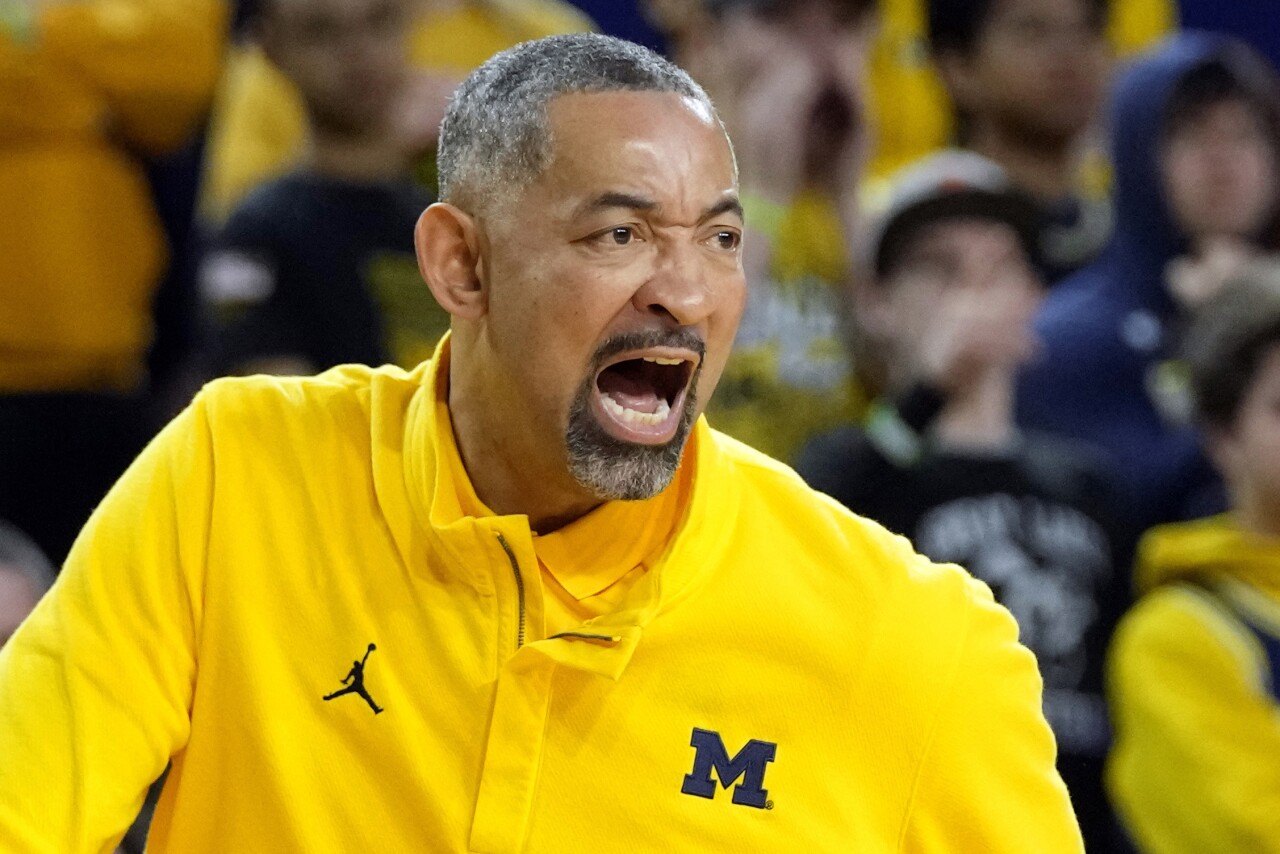 Michigan Wolverines basketball coach Juwan Howard yells, March 15, 2024