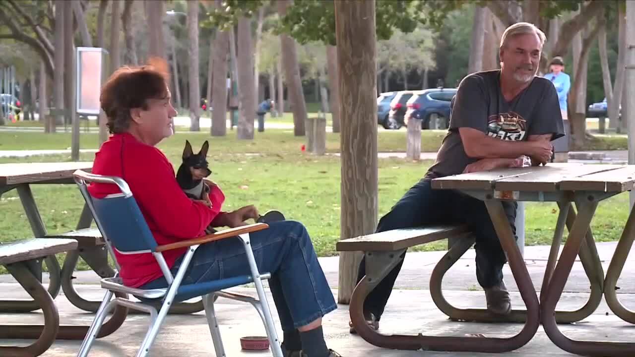 Thomas Saporito was enjoying the sunset with his dog and friend Steve Keane in Martin County. Feb. 13, 2024