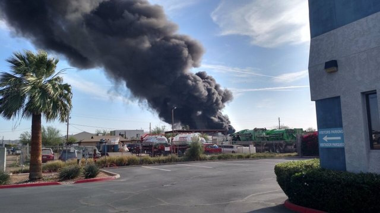 PHOTOS: Fire burns at PHX recycling plant