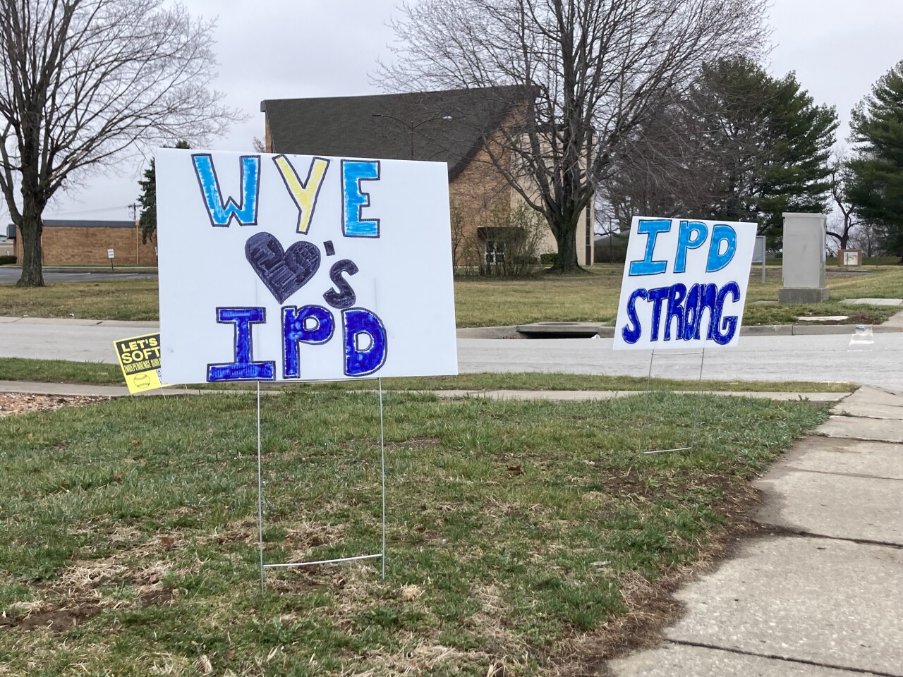 WYE Cody Allen procession signs.jpg