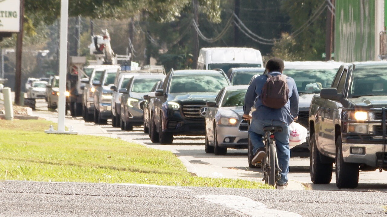 E-Bike Rider on South College Road