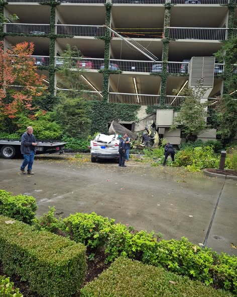 CDA car falls off parking garage 2