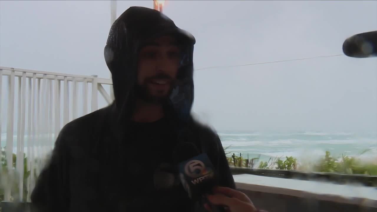 Brian Kiewicz comes to Lake Worth Beach to watch rain at pier