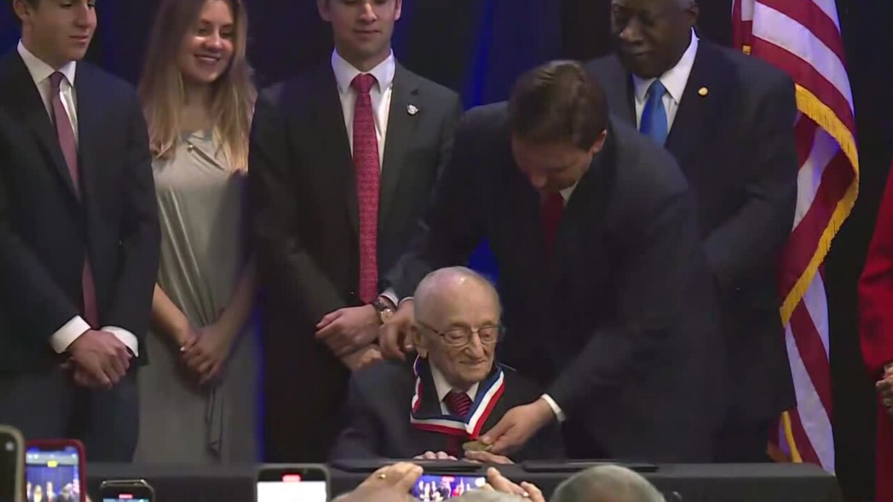 Gov. Ron DeSantis bestows medal of freedom to Benjamin Ferencz in Boca Raton, April 7, 2022