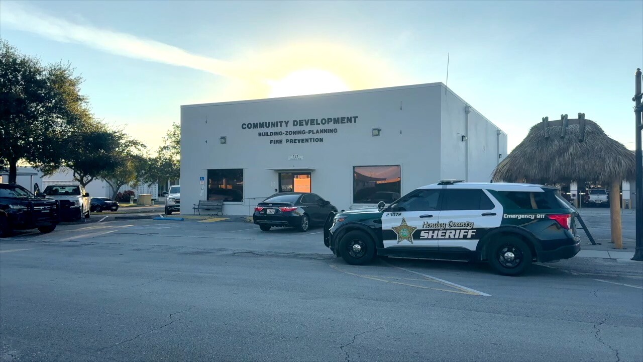 HCSO squad car outside Community Development building