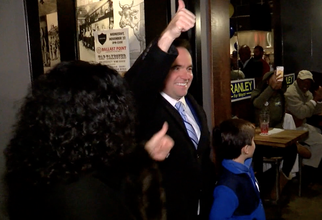 Cincinnati Mayor John Cranley with his wife, Dena, and son, Joseph, after winning re-election in 2017.
