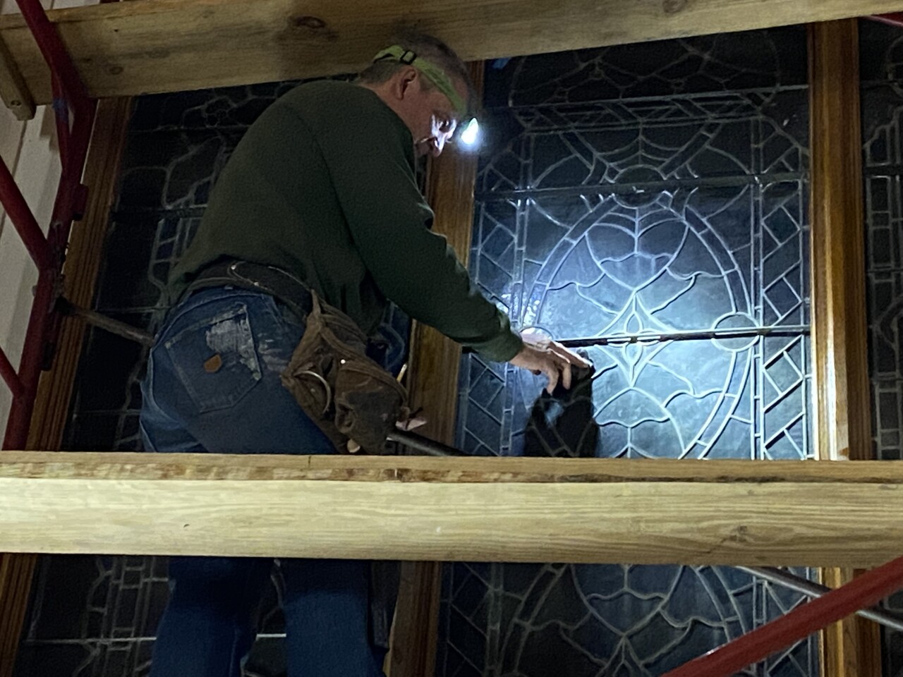 St Patrick working on windows