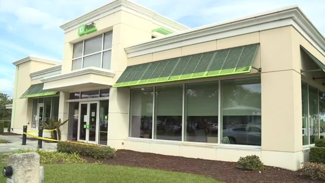 police tape surrounds TD Bank in Delray Beach after robbery, Feb. 1, 2022