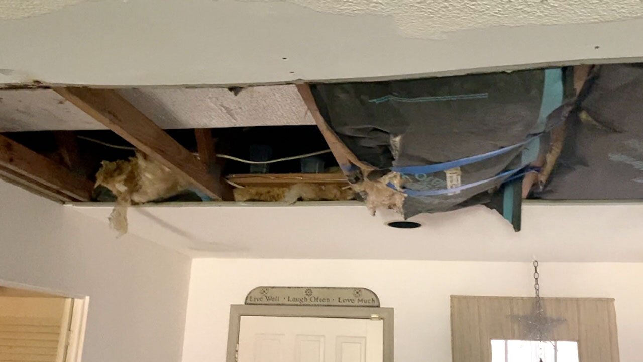 Damage to Tom and Suzi Lynch's home in Atlantis, Florida.