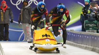 Germans sit 1-2-3, U.S. 4th midway through 2-man bobsled action