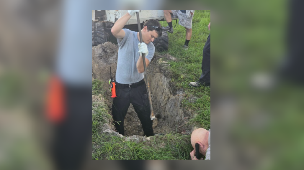 Dog stuck in sinkhole