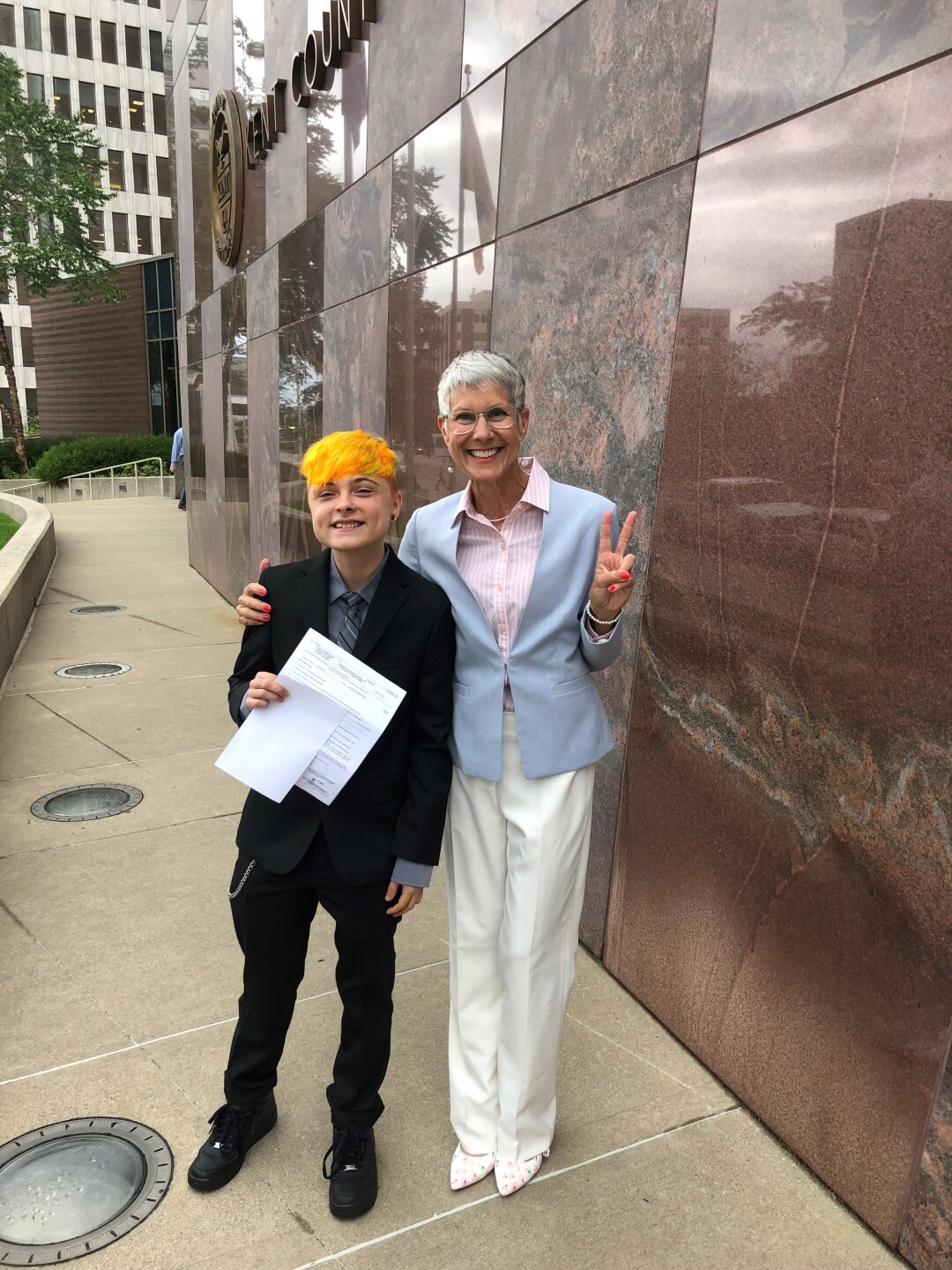 Ginny with client outside courthouse 2.jpg