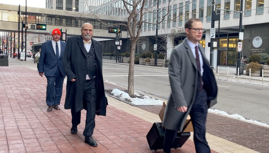 Former Ohio House Speaker Larry Householder and his attorneys walk into federal court on Jan. 24, 2023.