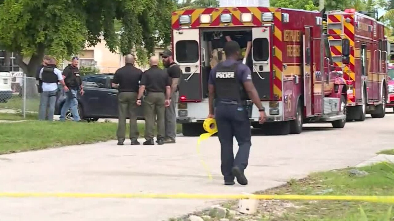 Ambulance outside home at Eadie Place and Rae Avenue in West Palm Beach, Oct. 3, 2022