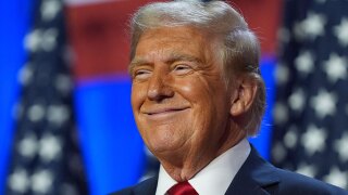 Republican presidential nominee former President Donald Trump smiles at an election night watch party at the Palm Beach Convention Center, Wednesday, Nov. 6, 2024, in West Palm Beach, Fla. 