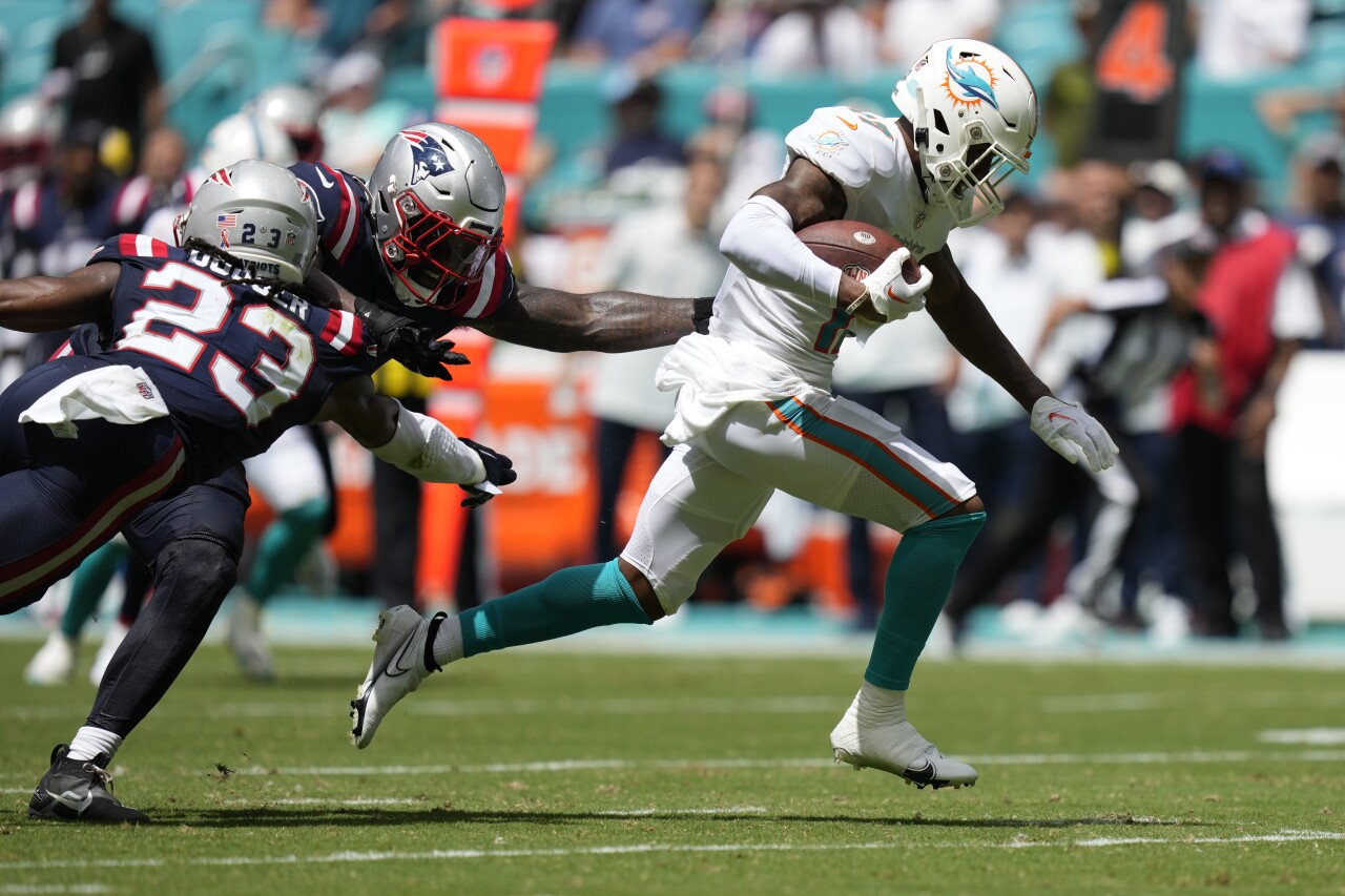 Miami Dolphins receiver Jaylen Waddle runs for TD vs. New England Patriots, Sept. 11, 2022