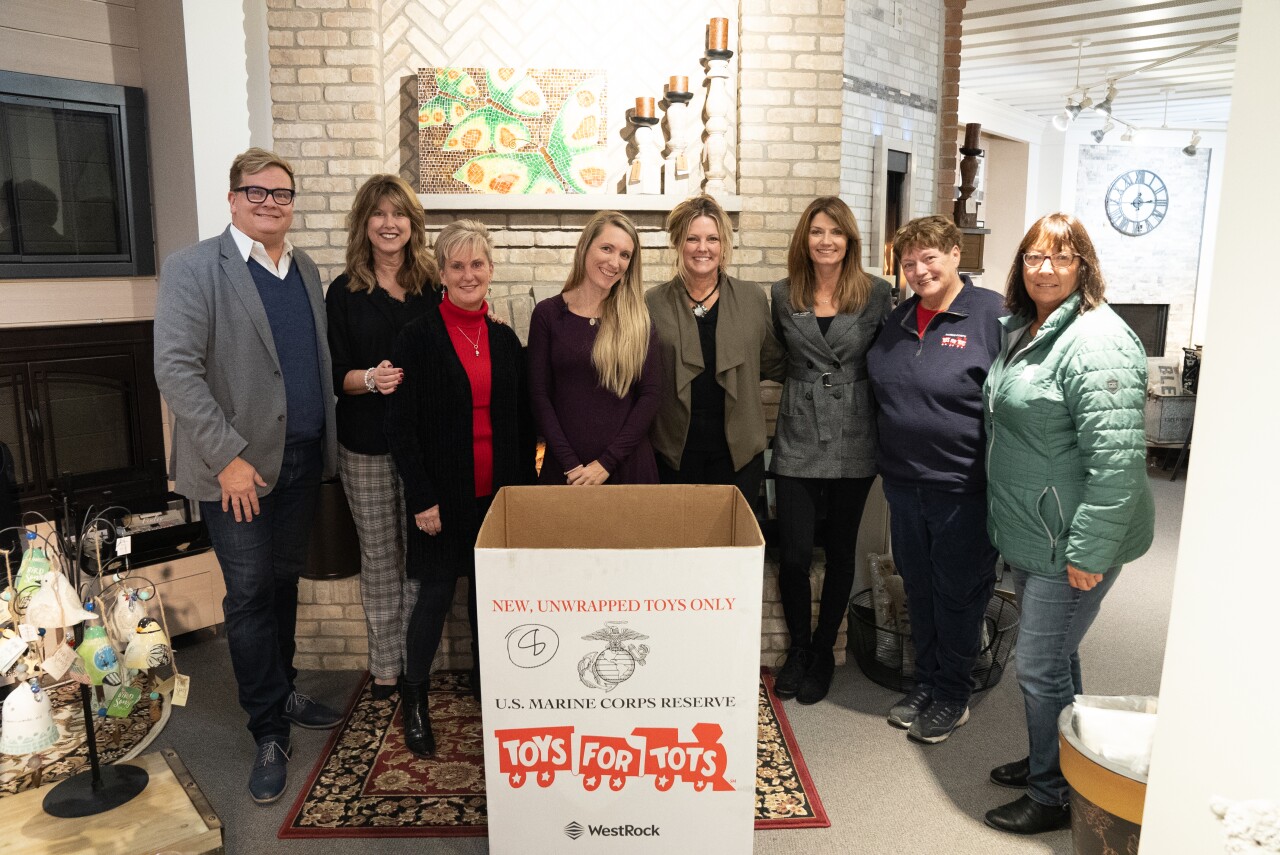 Bob poses with Toys for Tots helpers