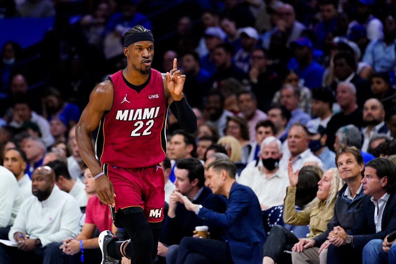 Miami Heat forward Jimmy Butler motions as he runs down court at Philadelphia 76ers, May 12, 2022