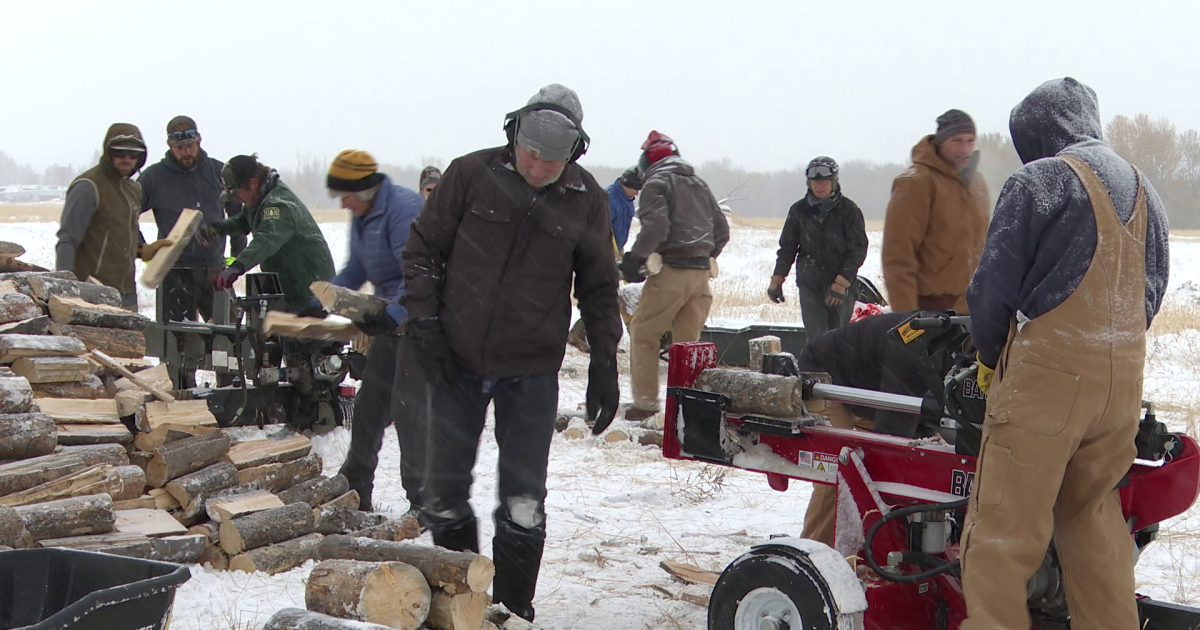 Volunteers cut wood for those in need as temps drop to near zero - Vimarsana News