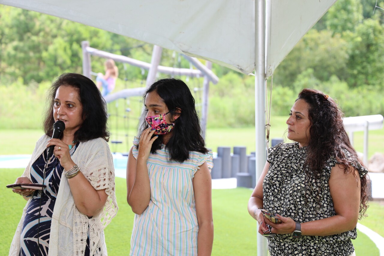 Parwez "P.A." Alam's sister gives some touching words about the former County Administrator at the Parwez "P.A." Alam Park dedication. PC: Leon County
Pictured (left to right): Ghazala Alam, P.A.'s sister, Zahra Alam, P.A.'s daughter; Adeena Alam, P.A.'s daughter