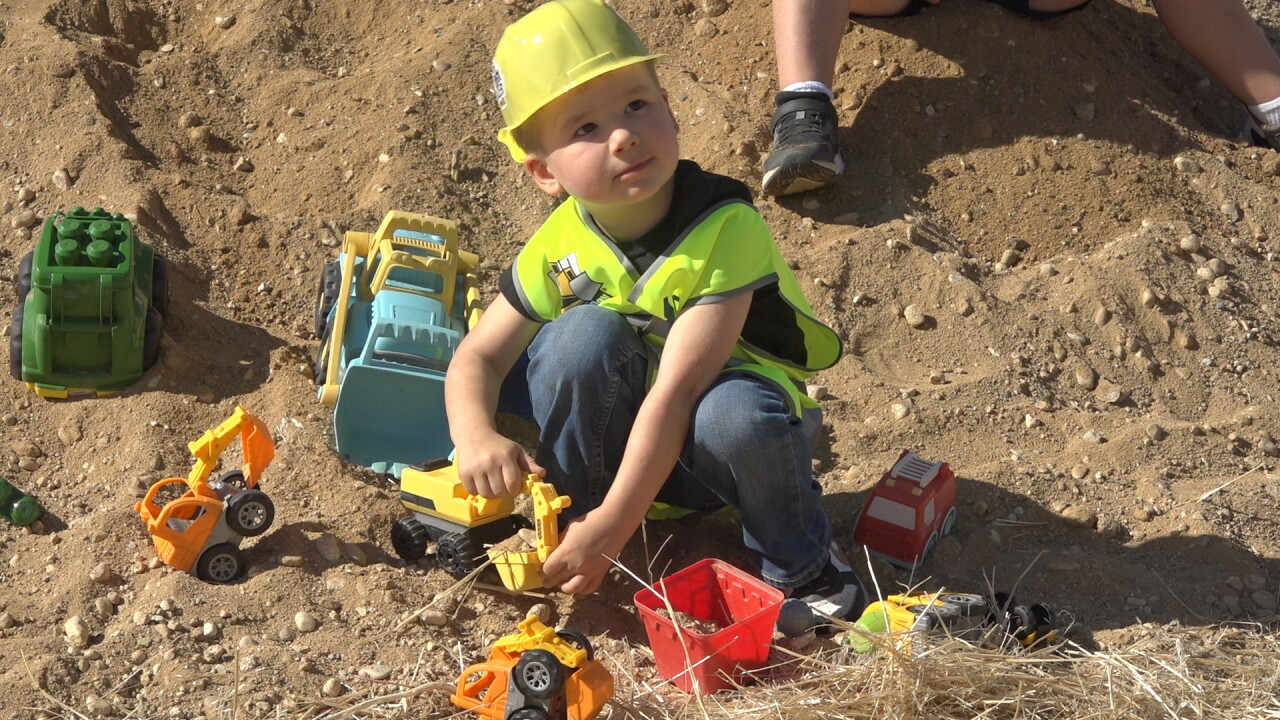 Vedeop's son plays in the sand