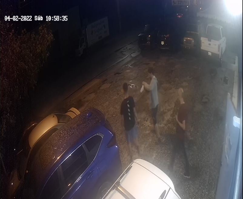 Surveillance video in West Palm Beach. Jorge Mobilla Menendez, the victim, is at far right in brown shirt.