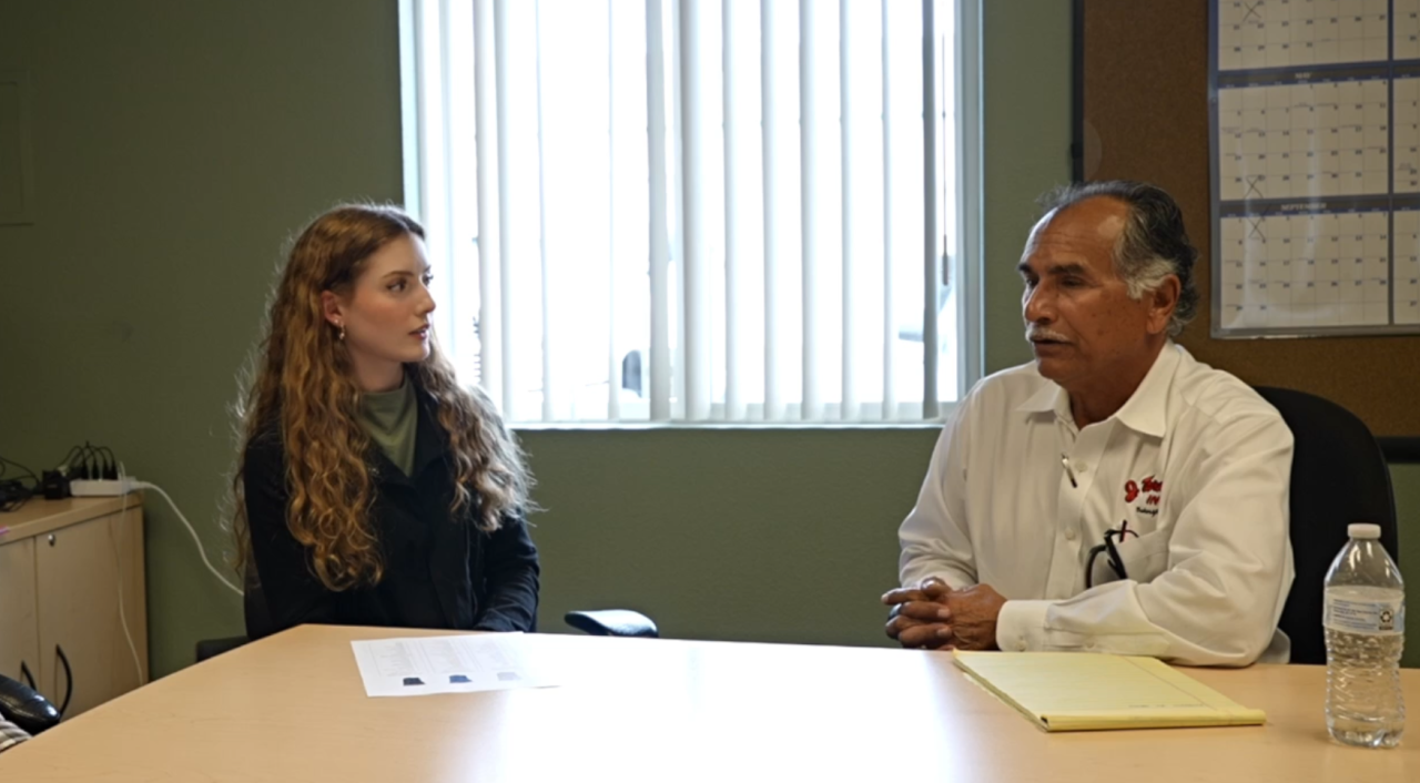 Neighborhood News Reporter Grace Laverriere interviewing Joe Torres, general manager of J. Torres Co. He says he's been impressed with how people have responded to the new law so far.