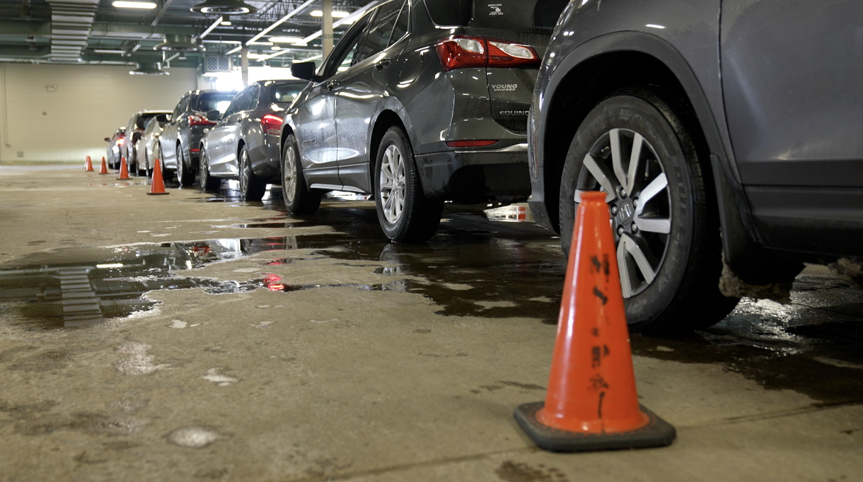 Cars lined up after getting vaccinated at the MSU Pavillion.