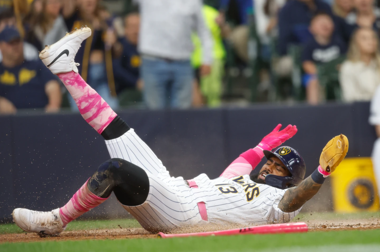 Milwaukee Brewers' Luis Rengifo scores during the fourth inning of a baseball game against the New York Yankees, Sunday, May 10, 2026, in Milwaukee.