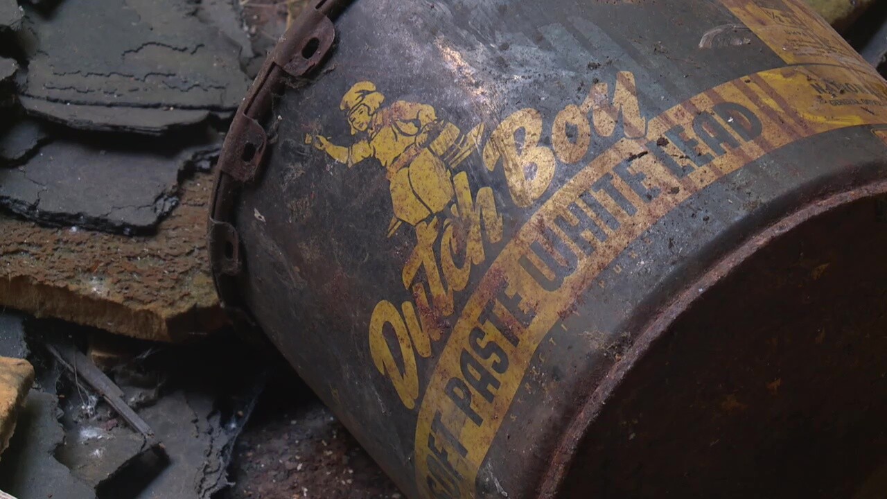 An old paint can is part of the pile of rubble at the National Acme factory in Cleveland.