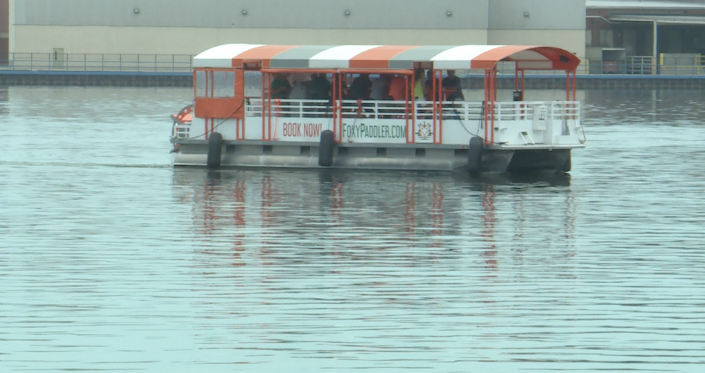 Passengers enjoying the beautiful weather on the Fox River in Green Bay