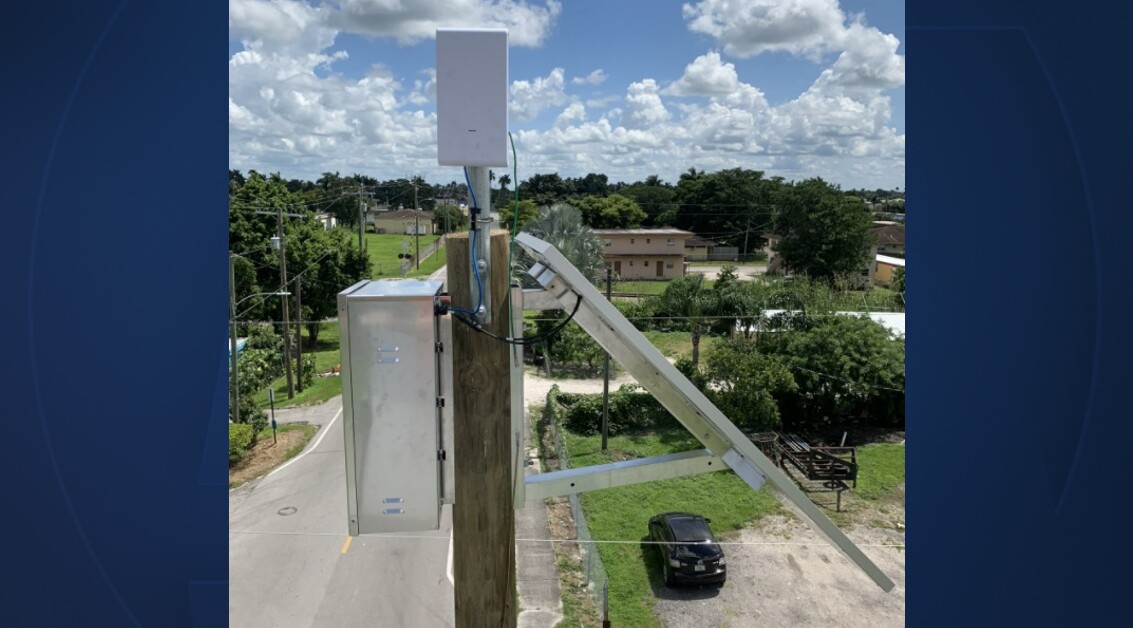 A pole and WiFi mesh radio in Belle Glade, part of the School District of Palm Beach County's Municipal WiFi Project.jpg