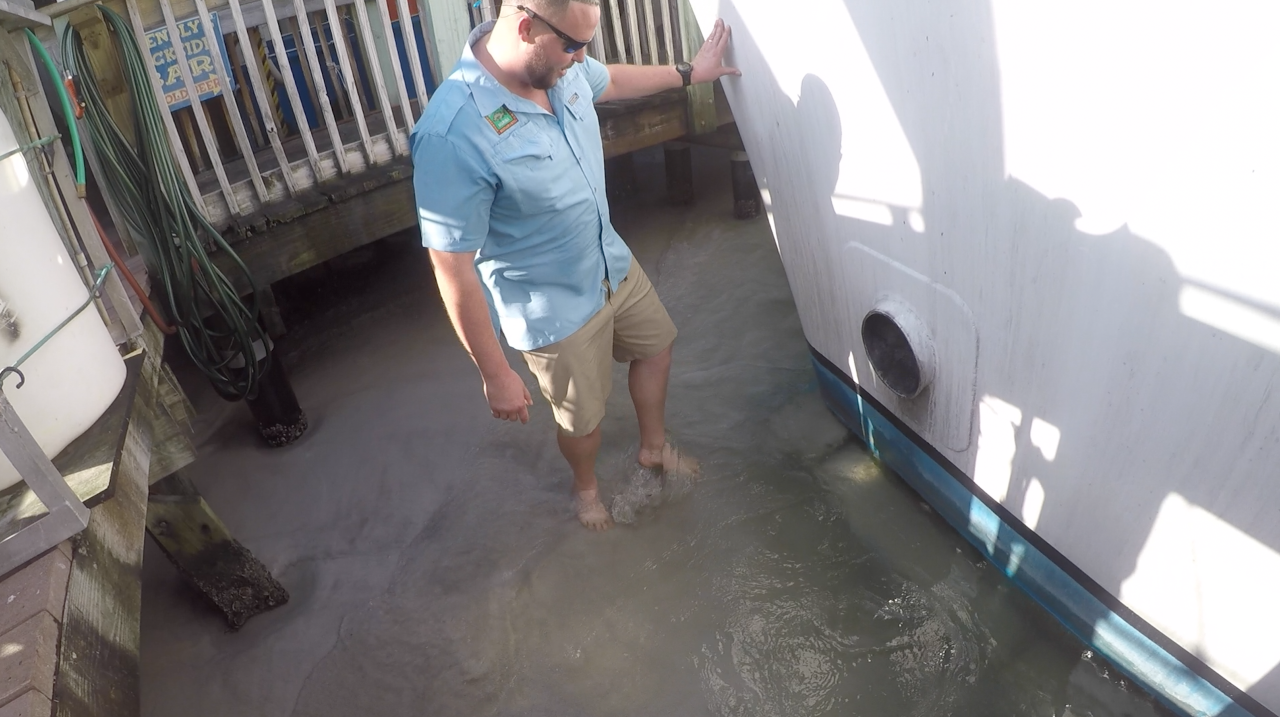 Hubbard's Marina boat stuck in the sand