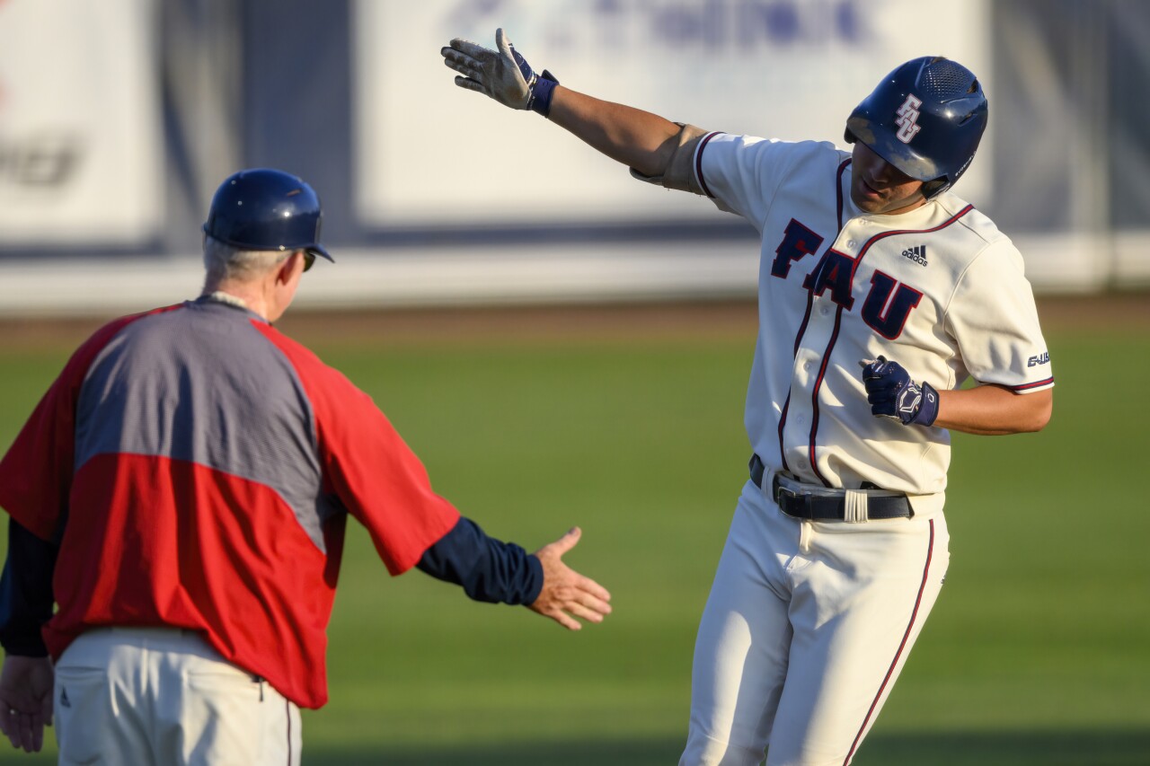 FAU Owls first baseman Nolan Schanuel celebrates as he rounds bases after hitting home run against Florida Gulf Coast Eagles, April 4, 2023