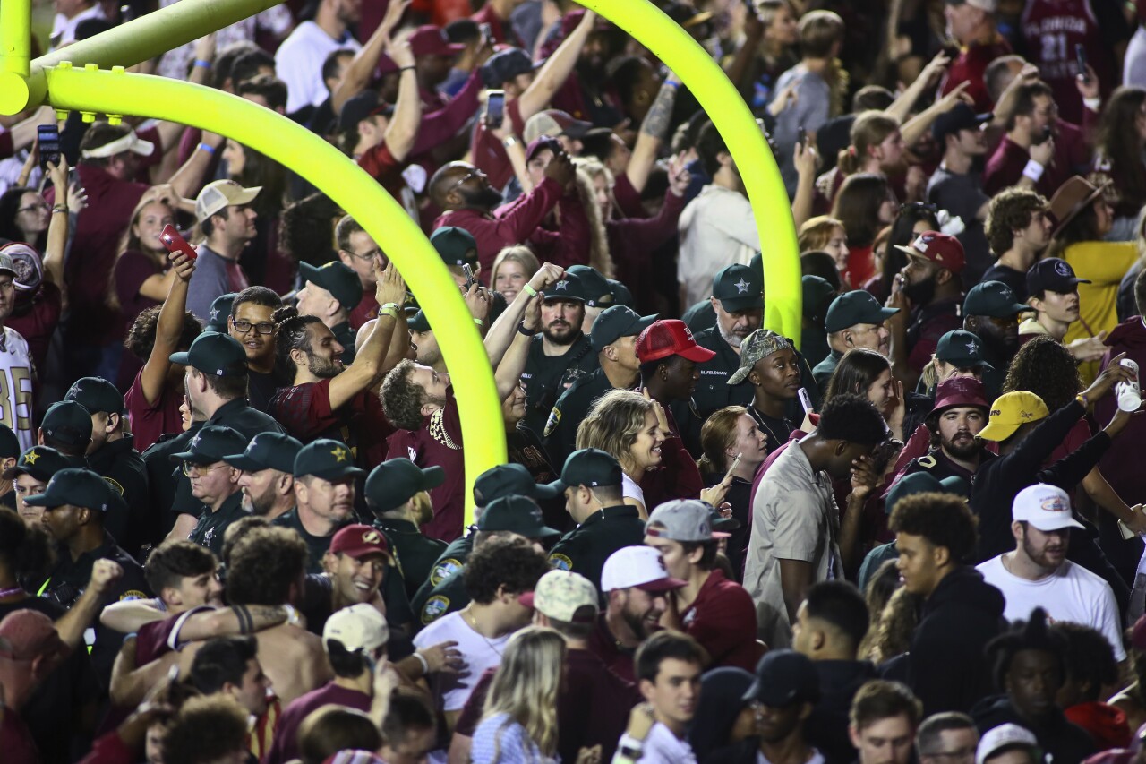 Law enforcement guard goal posts after Florida State Seminoles defeat Florida Gators, Nov. 25, 2022