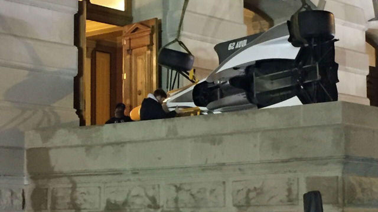 PHOTOS: Crews put IndyCar inside Statehouse